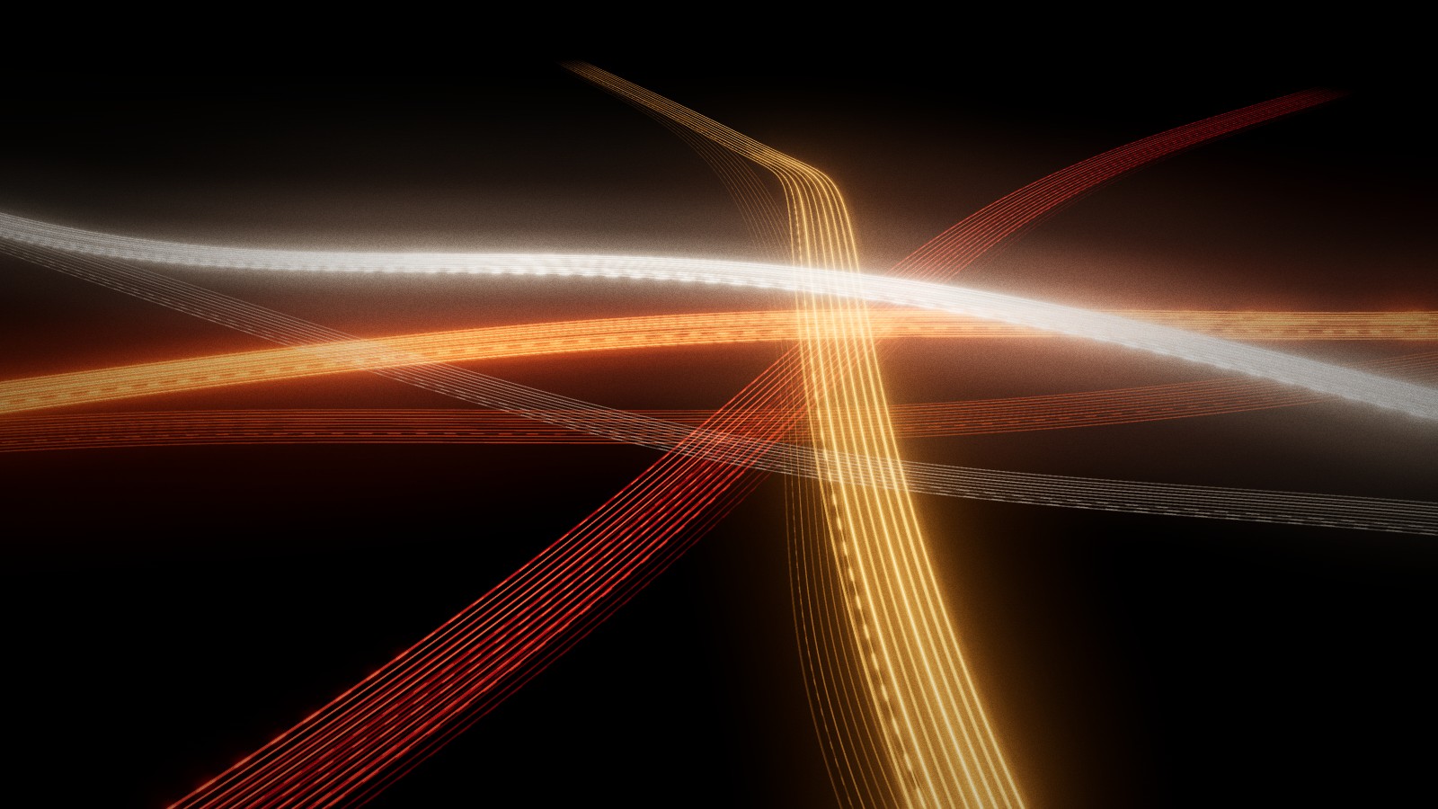 Hundreds of light trails form ribbons that cross at one stacked interchange in the dark.